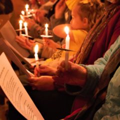 Ukrainian community gathers to offer prayers and songs for the “homeland” at candlelight vigil